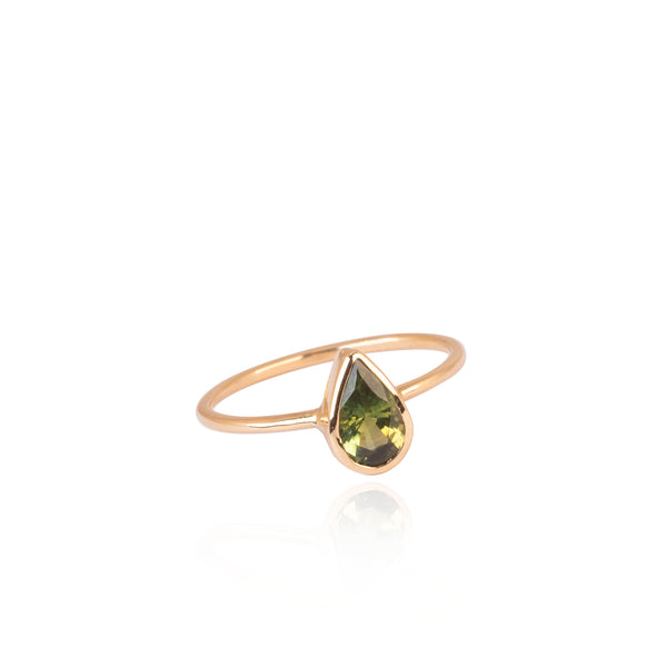 gold ring with green sapphire drop