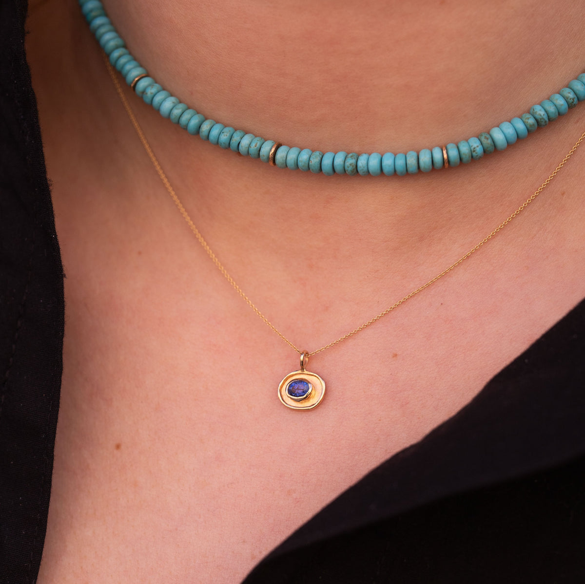 gold necklaces with blue gemstones
