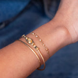 gold bracelets in 18k with diamonds and sapphire