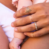 hand with gold rings