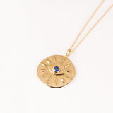 gold necklace with evil eye
