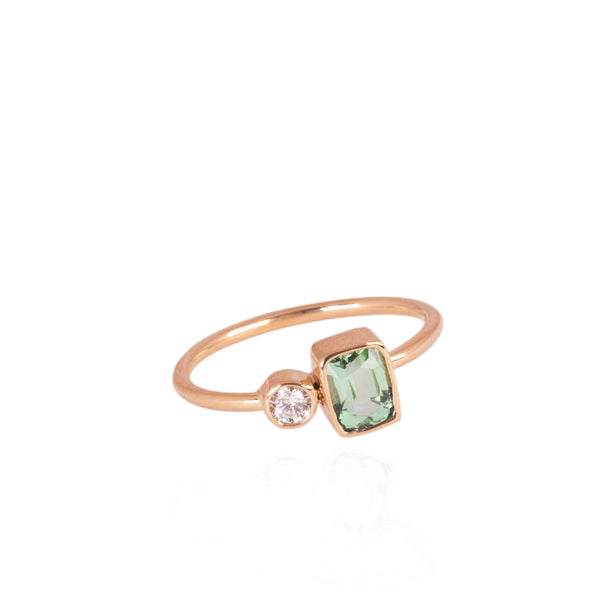 Gold ring with aqua green tourmaline and diamond