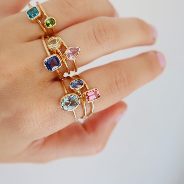colorful gemstone rings in gold