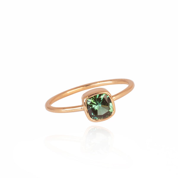 gold ring with green stone