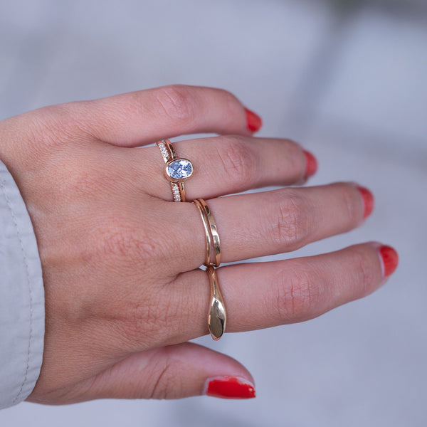 hand with gold rings