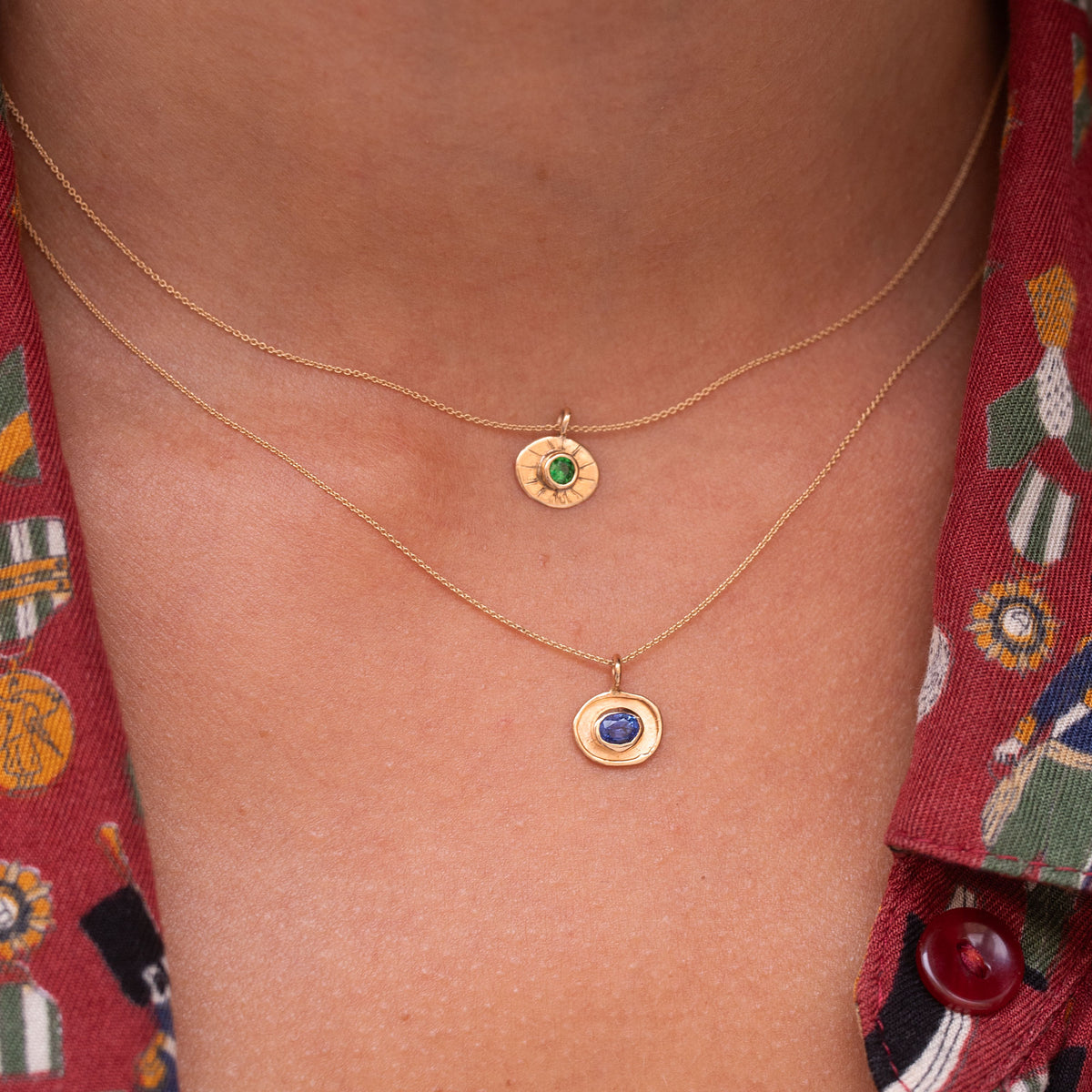 mini amulette necklaces in 18k gold