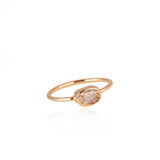Gold ring with a light peach stone