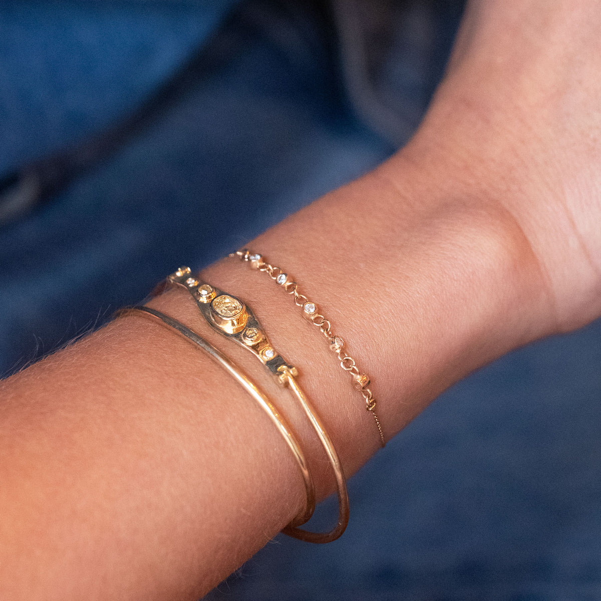 gold bracelets in 18k with diamonds and sapphire