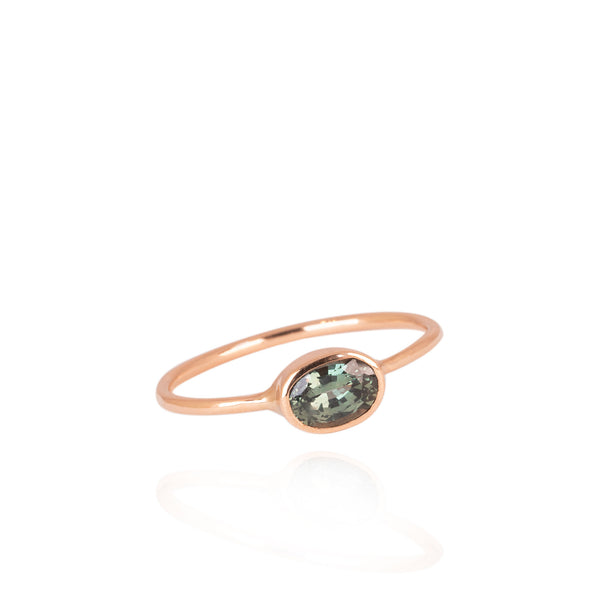 gold ring with green sapphire
