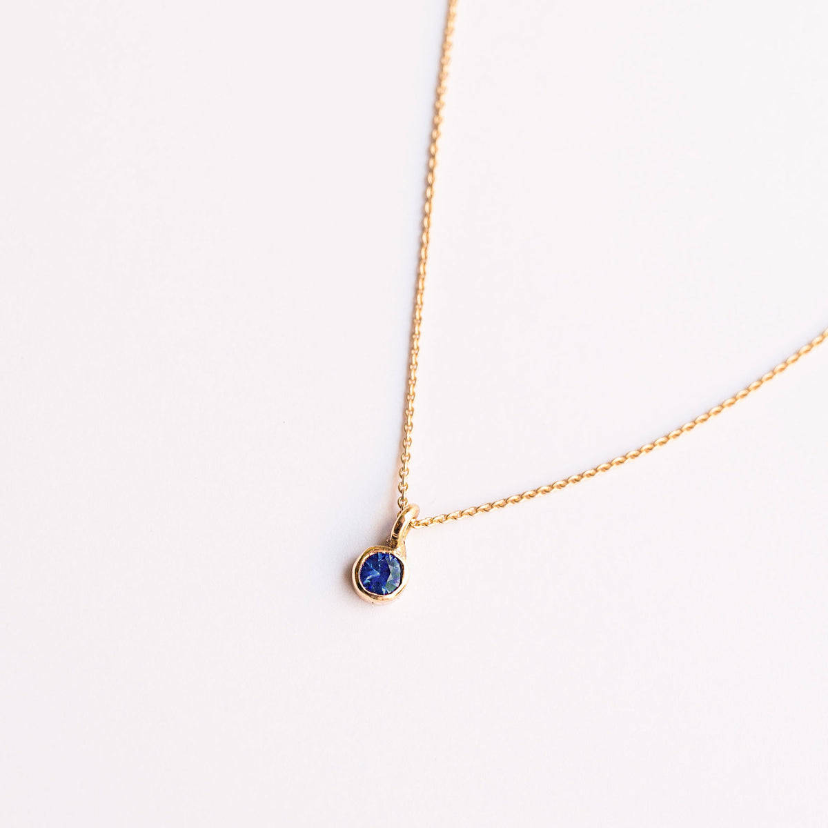 tiny blue sapphire necklace